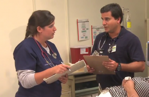 Nurse taking a simulation test with an instructor